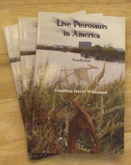 pile of paperback cryptozoology book about live pterodactyls